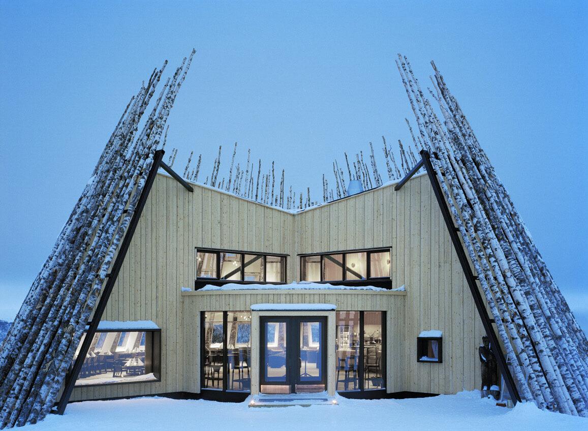 Restaurant Tusen seen with its birch hut-looking exterior and modern interior. An example of innovative Swedish architecture.