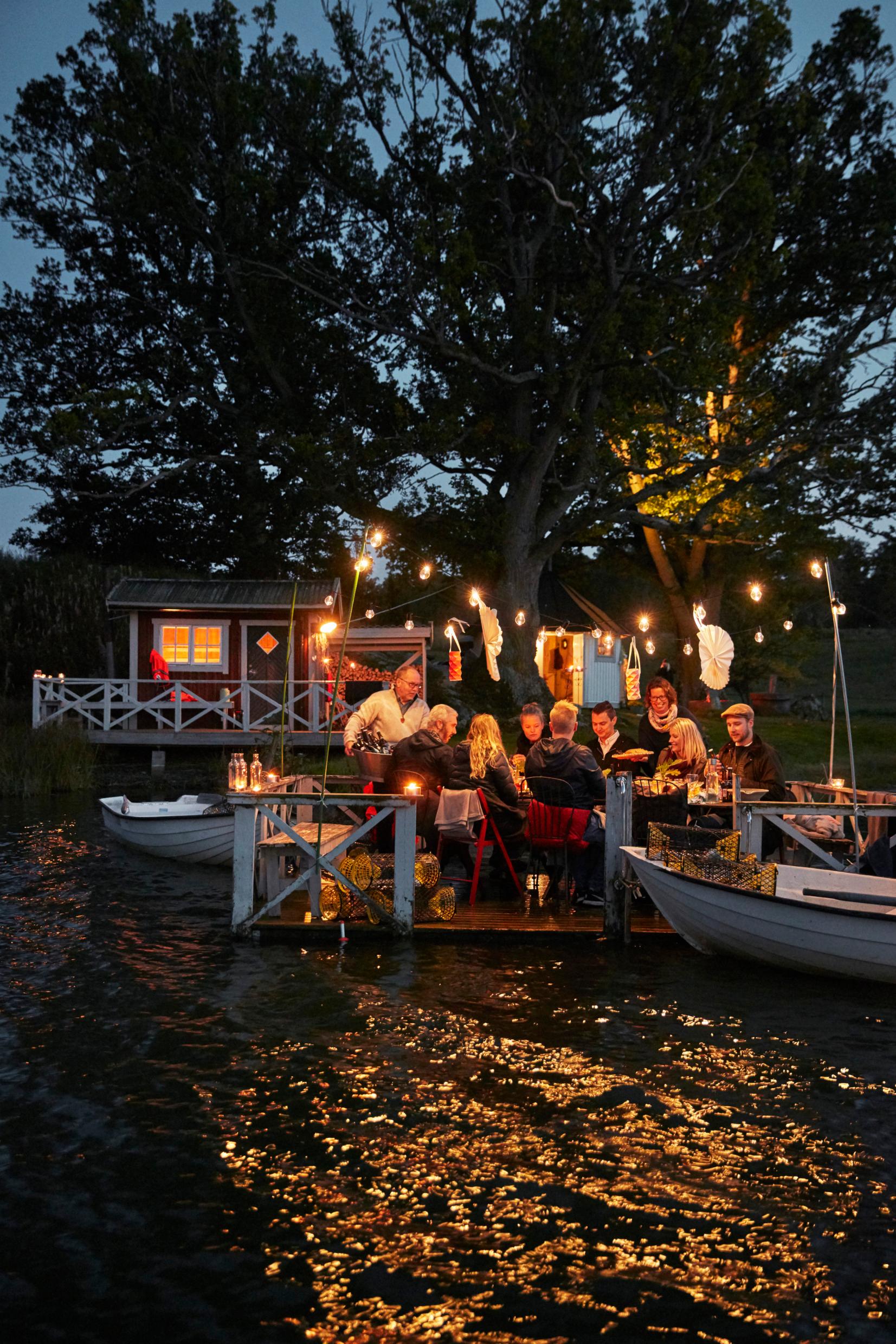 Crayfish festivities on a jetty in a lake.