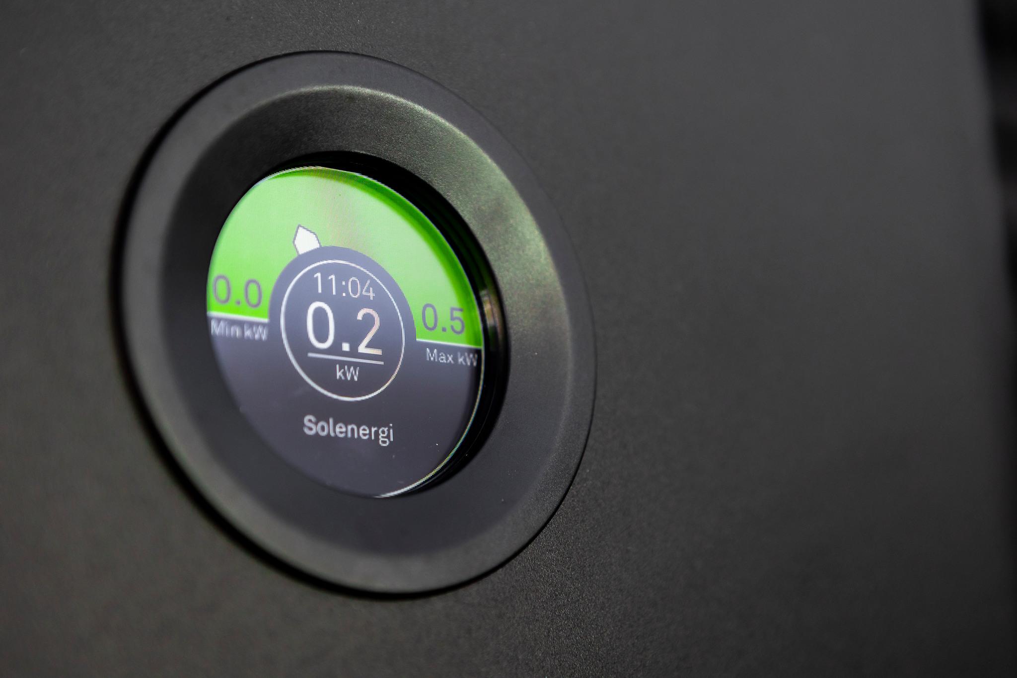 A digital meter showing solar energy levels.