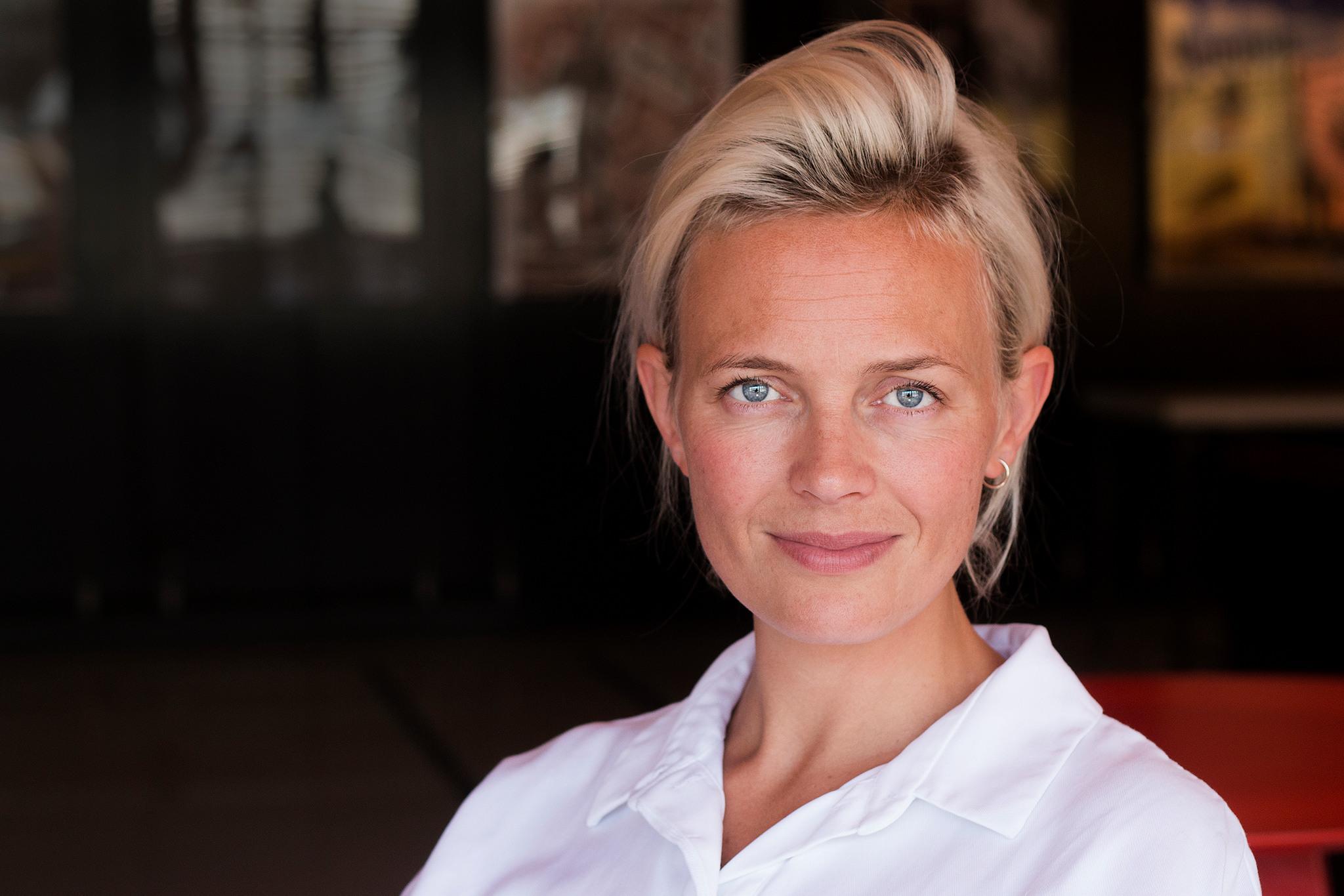 Portrait of Josephine Bornebusch wearing a white shirt. This actor and director has done a lot for Swedish films and series.