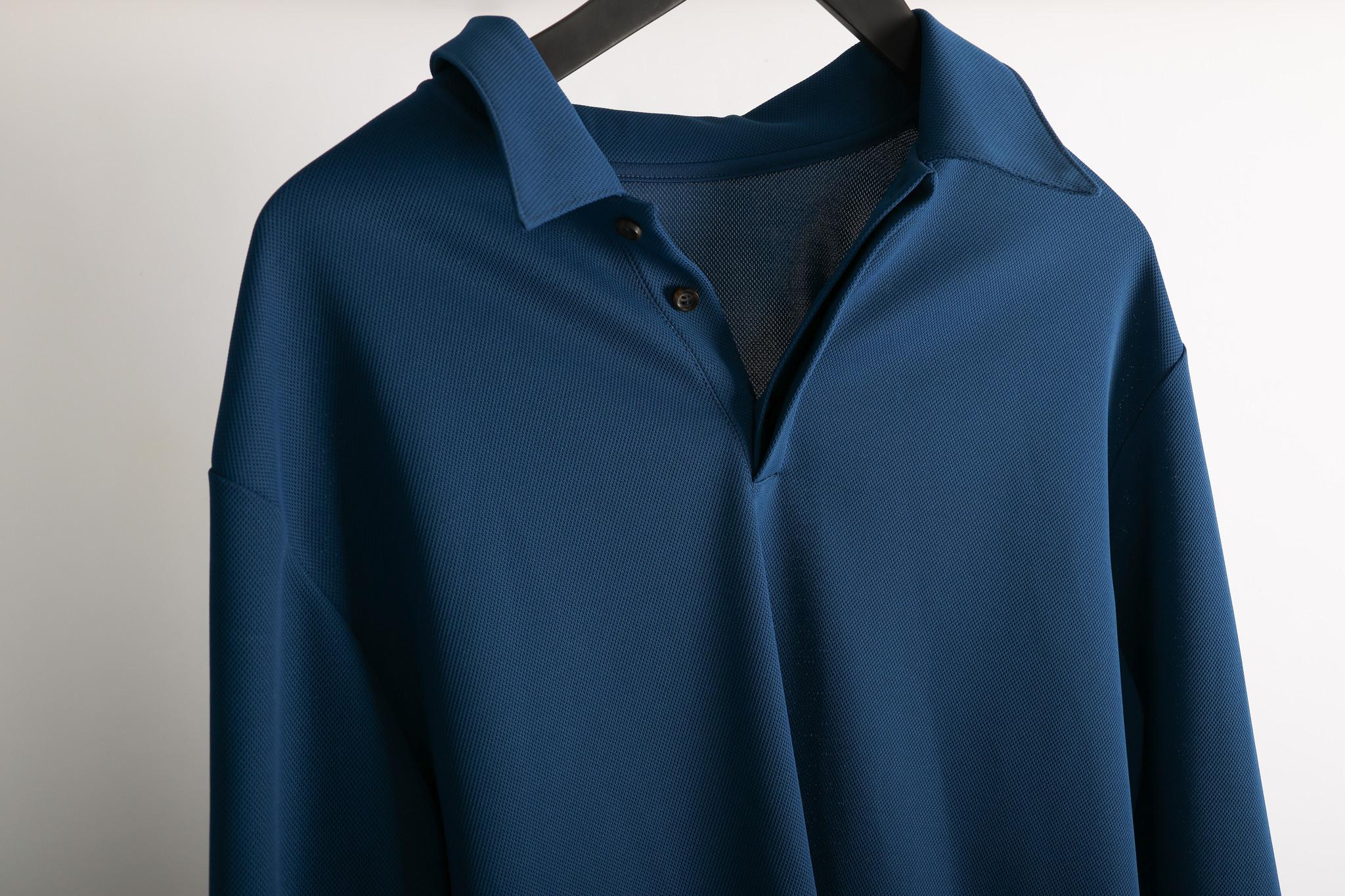 A blue shirt on a hanger.