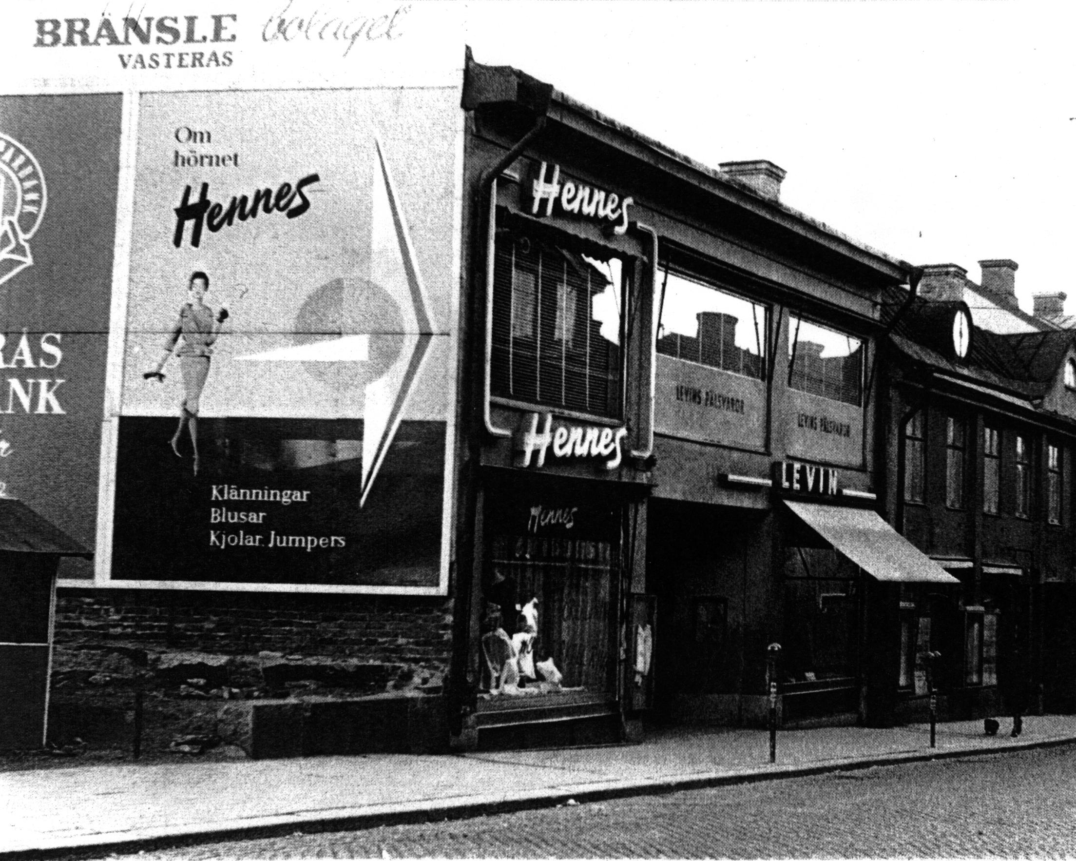 A black-and-white photo showing an H&amp;M store.