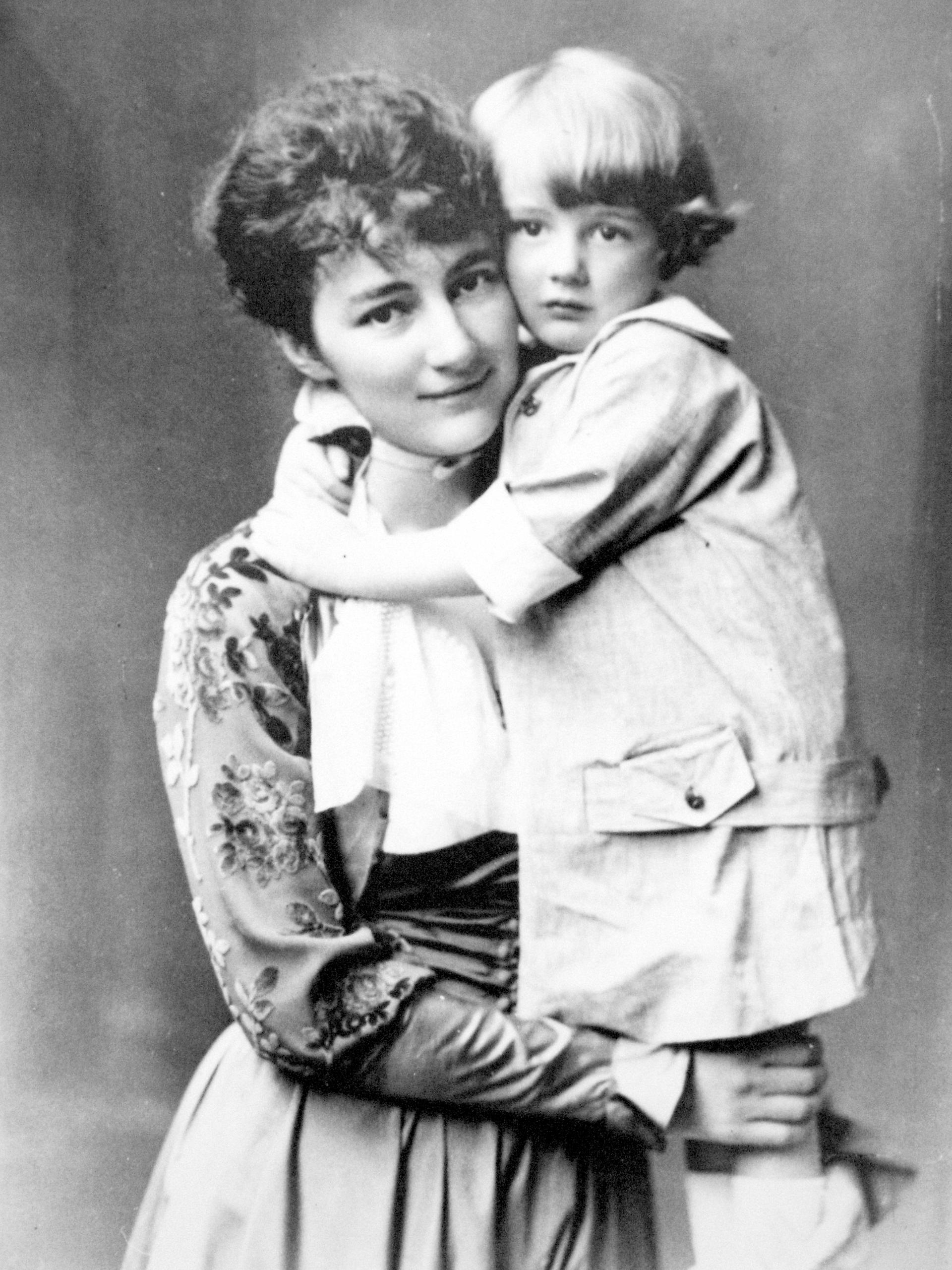 Black-and-white photo of Raoul Wallenberg as a child with his mother.