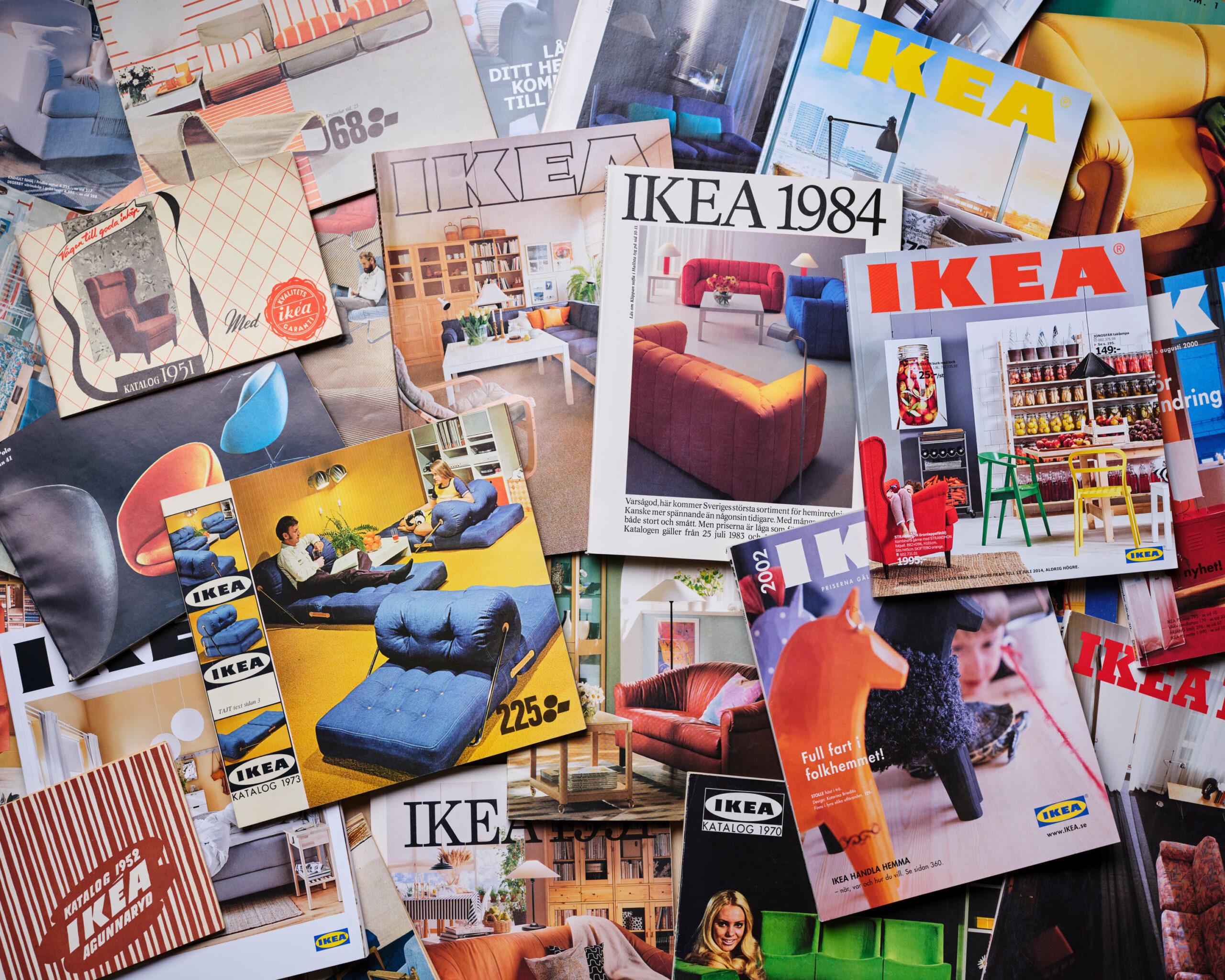Many IKEA catalogues spread out.