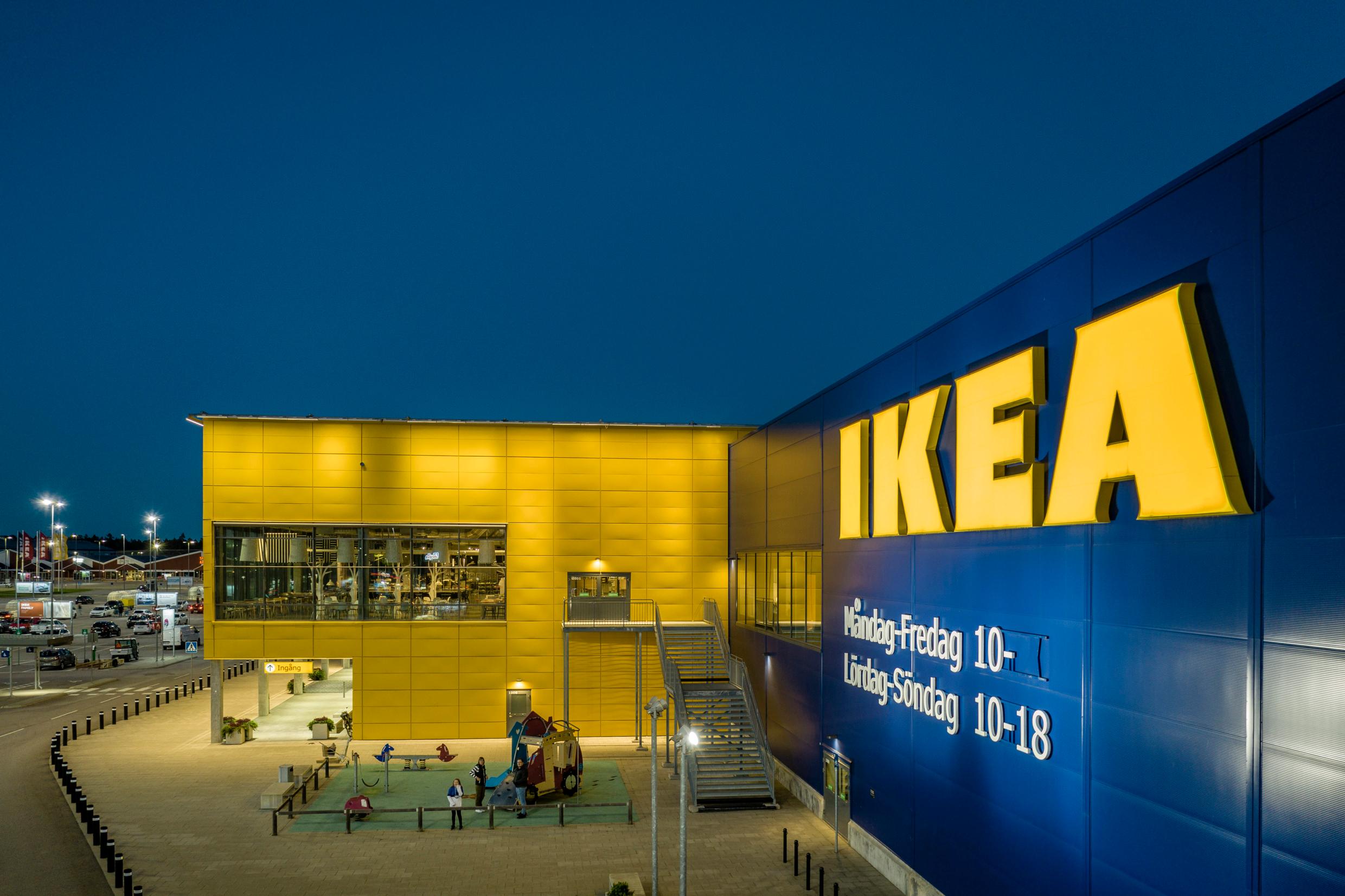 A large building in blue and yellow with IKEA written on it.