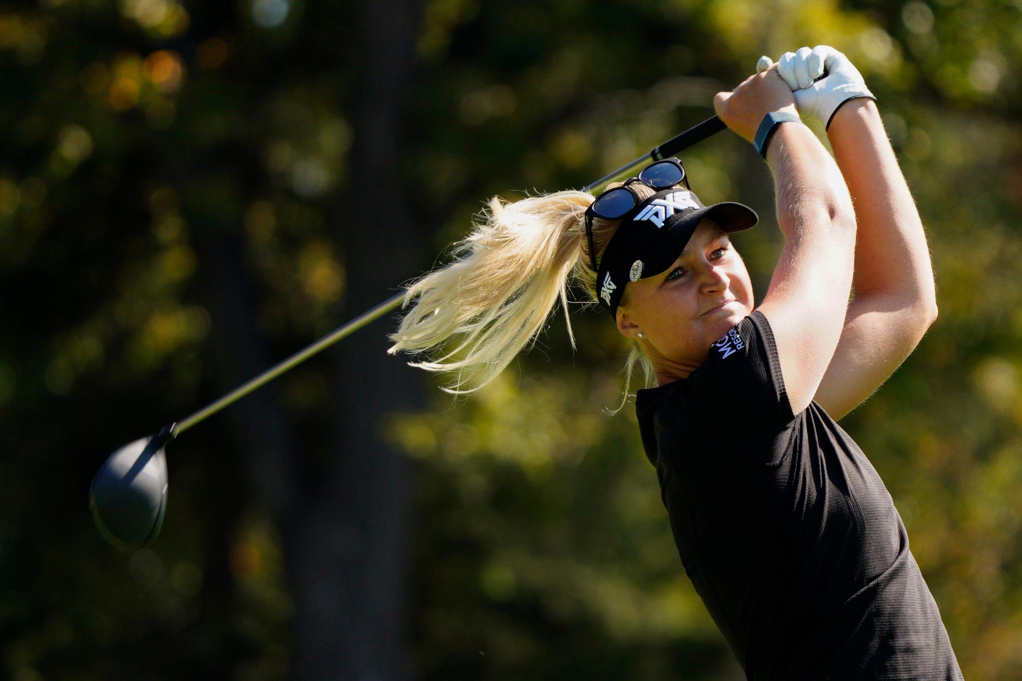 Anna Nordqvist swinging a golf club.